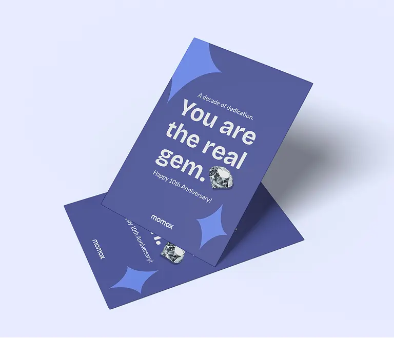 A cover image for the momox biz refresh project showing the momox biz logo on a white background with colorful shapes