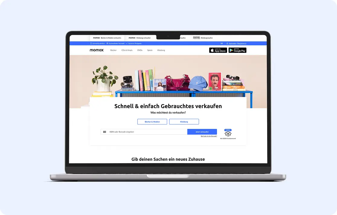 A picture of a macbook showing the new momox refresh website